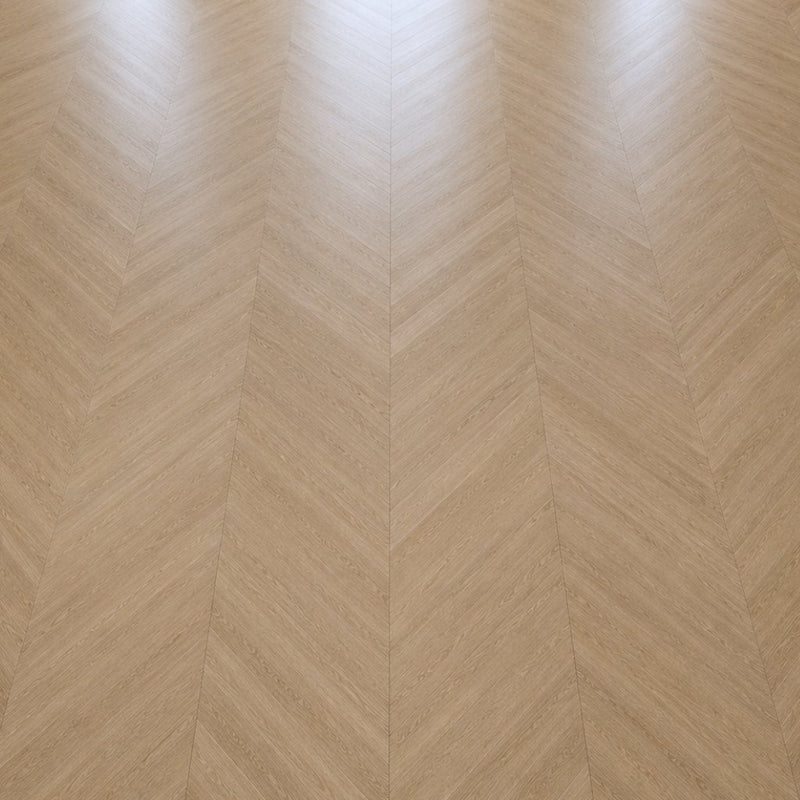 Detailaufnahme des Chevron-Verlegemusters in Braun – charakteristisches V-förmiges Design