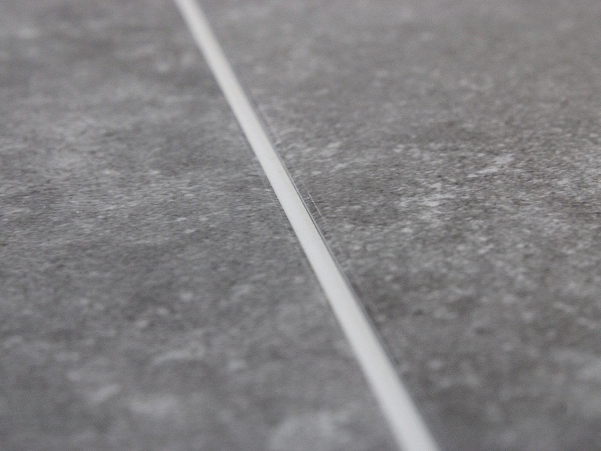 Vinylboden Fliesenoptik Concrete White integrierte